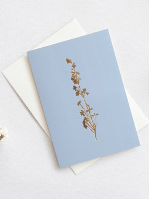 Ola Studio Foil Blocked Heather Card Brass on Cornflower Blue - Cloudberry Living